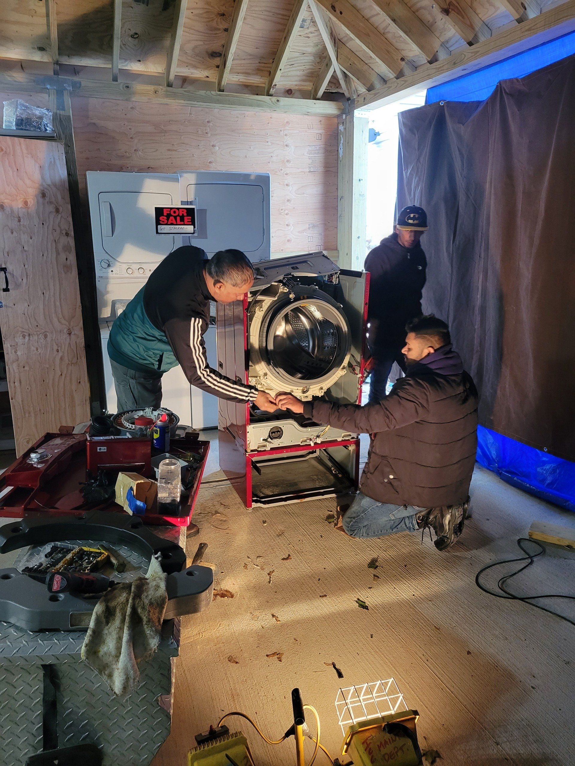 open door of an empty washing machine close up