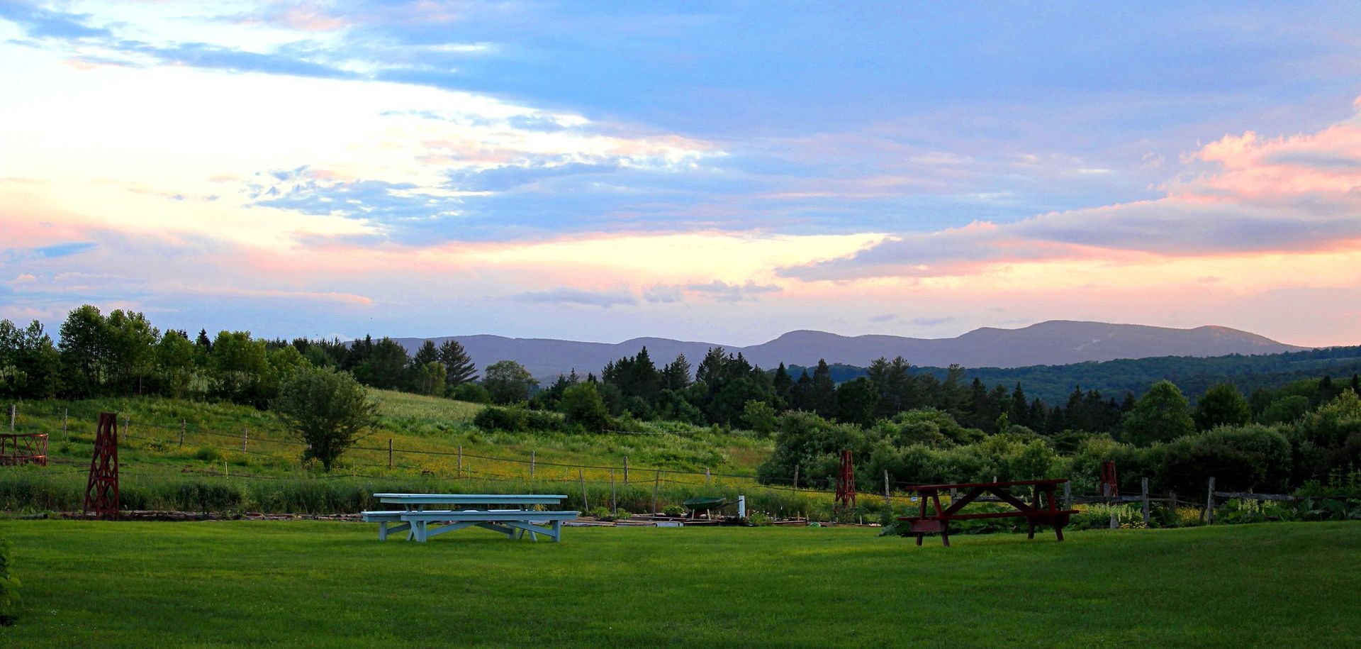 A picnic bench in front of gorgeous mountain views in Burke, Vermont
