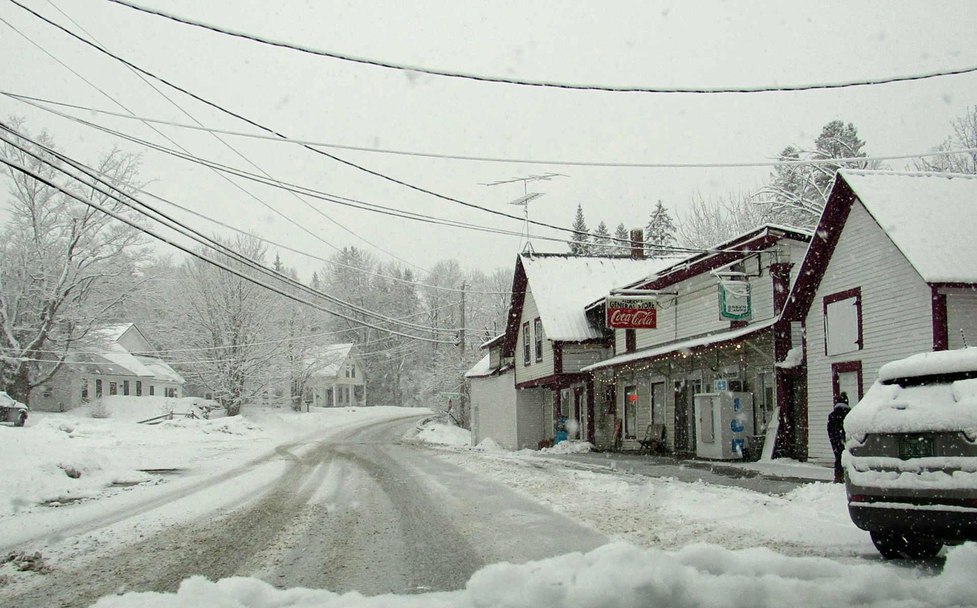 snow-covered streets in front of the Burke, Vermont town store