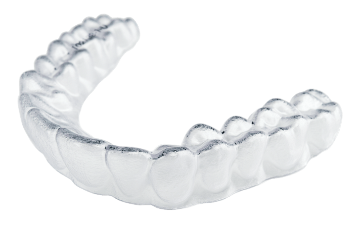 A close up of a clear brace on a white background.