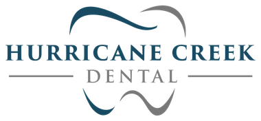 A logo for a dental office called hurricane creek dental.