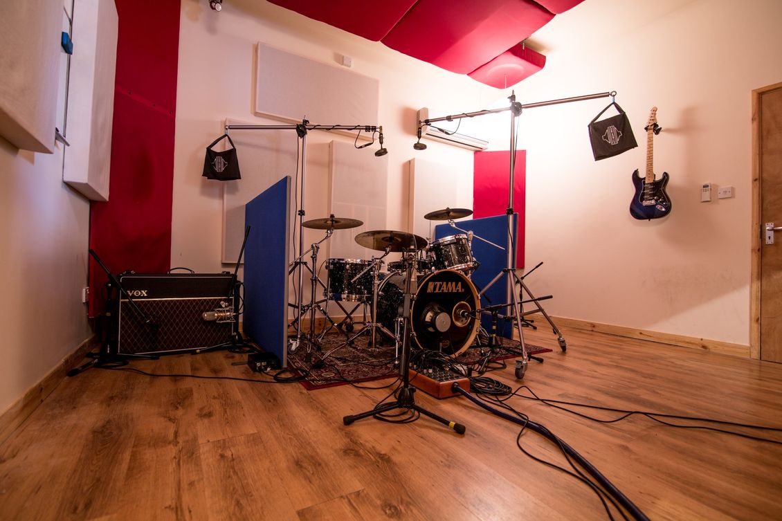 A view of the live room set up for a live session at new cut studios - Drums, bass and guitar