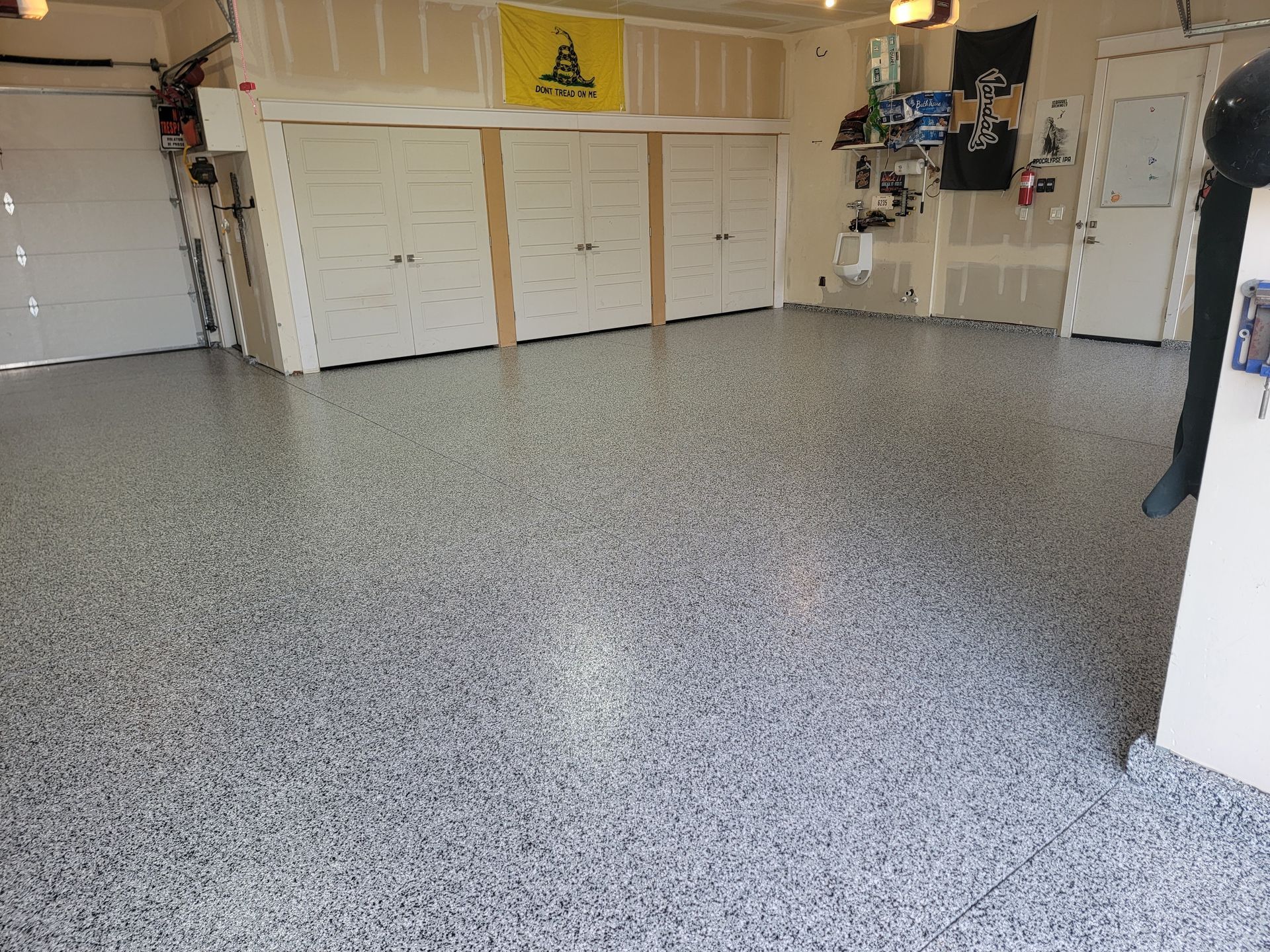 A garage with a flag that says liberty on it