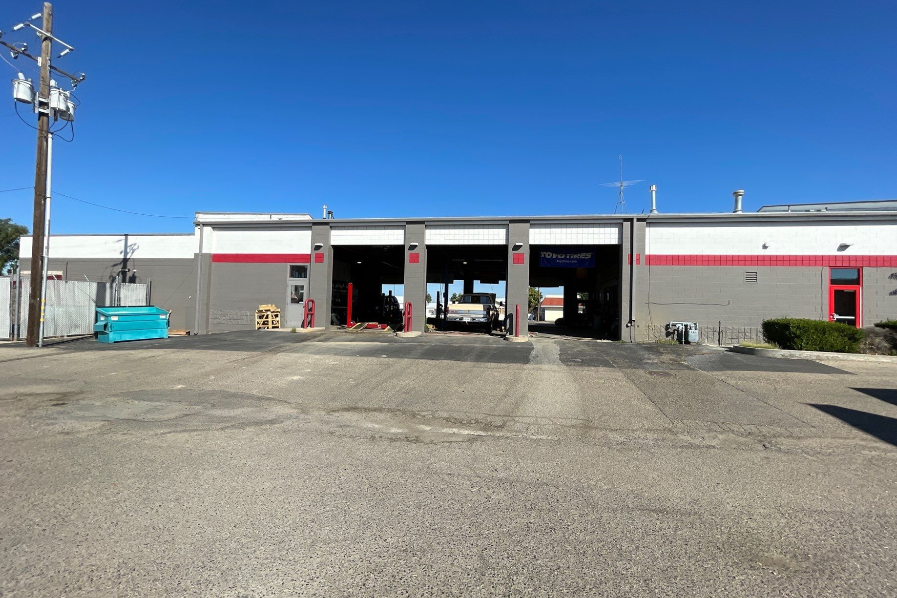 A large building with a lot of cars parked inside of it