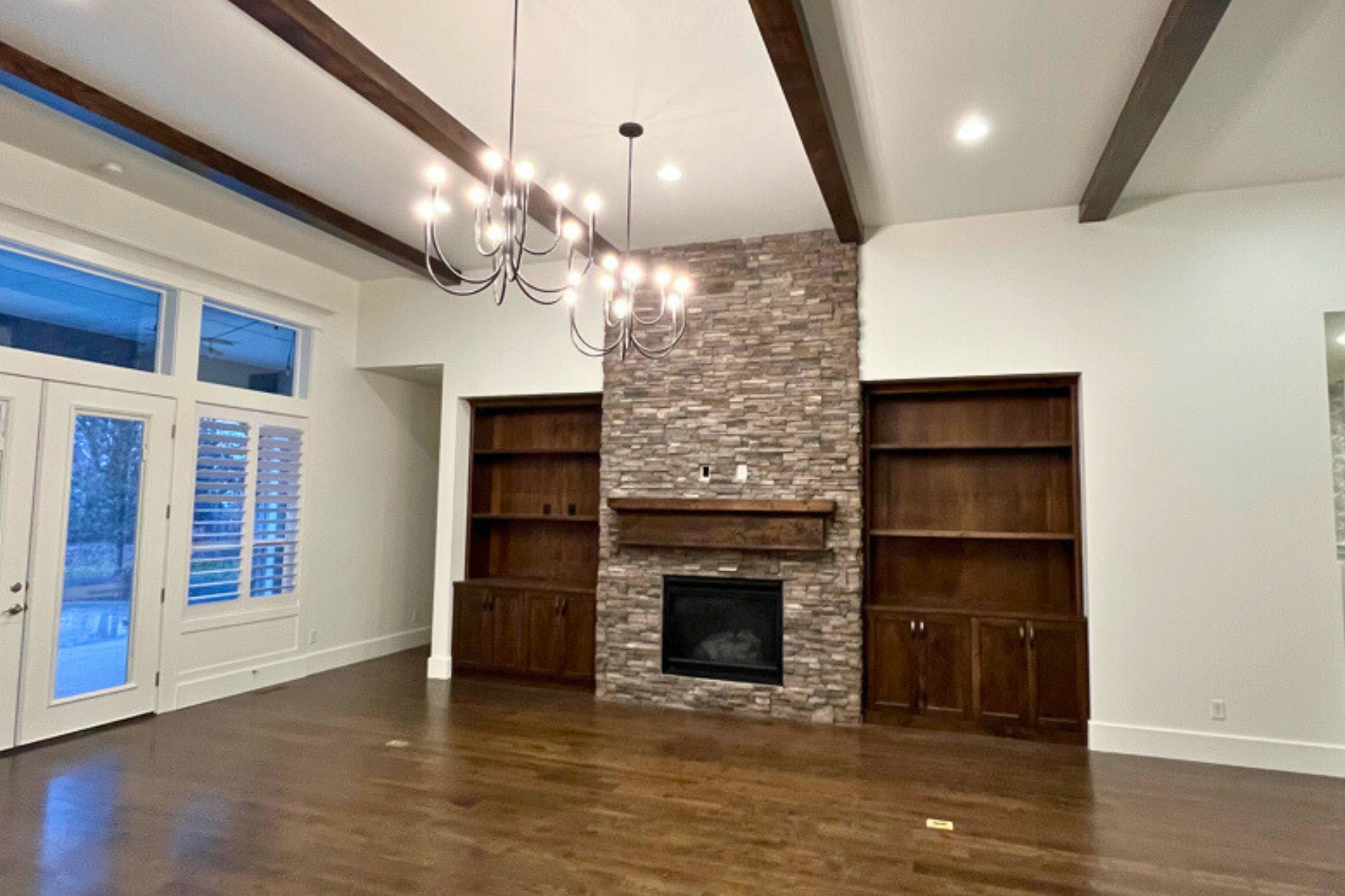 There is a fireplace in the middle of the room.