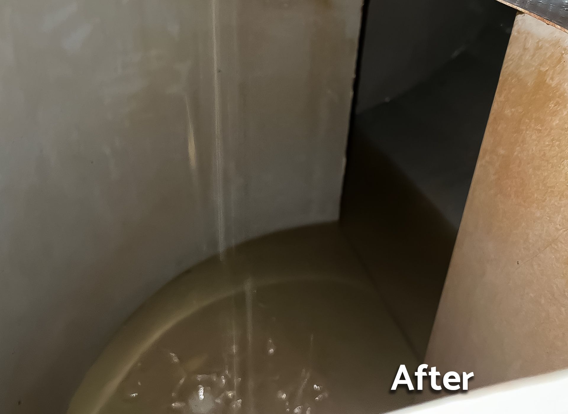A picture of a bucket of water with the caption after