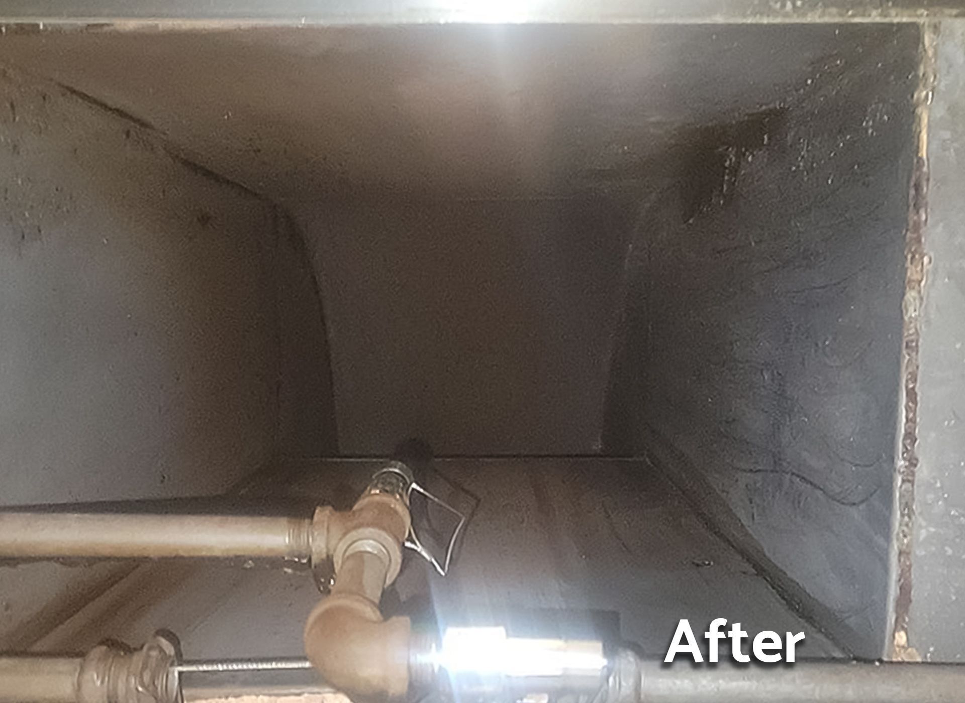 A picture of a room with pipes and a sign that says `` after ''.
