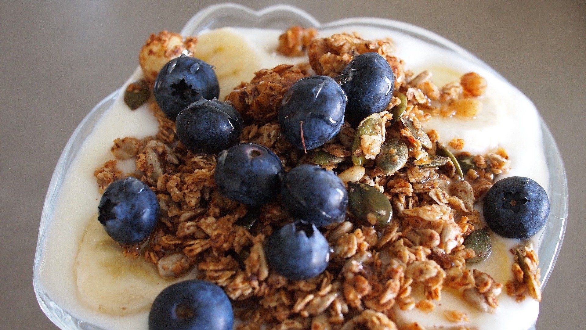 Home made granola with. yogurt and blueberries