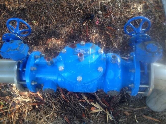 Blue Backflow Device — Reef City Plumbing in Beecher, QLD