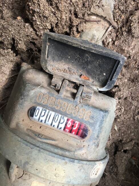 Water meter in the ground - Plumbing Gladstone