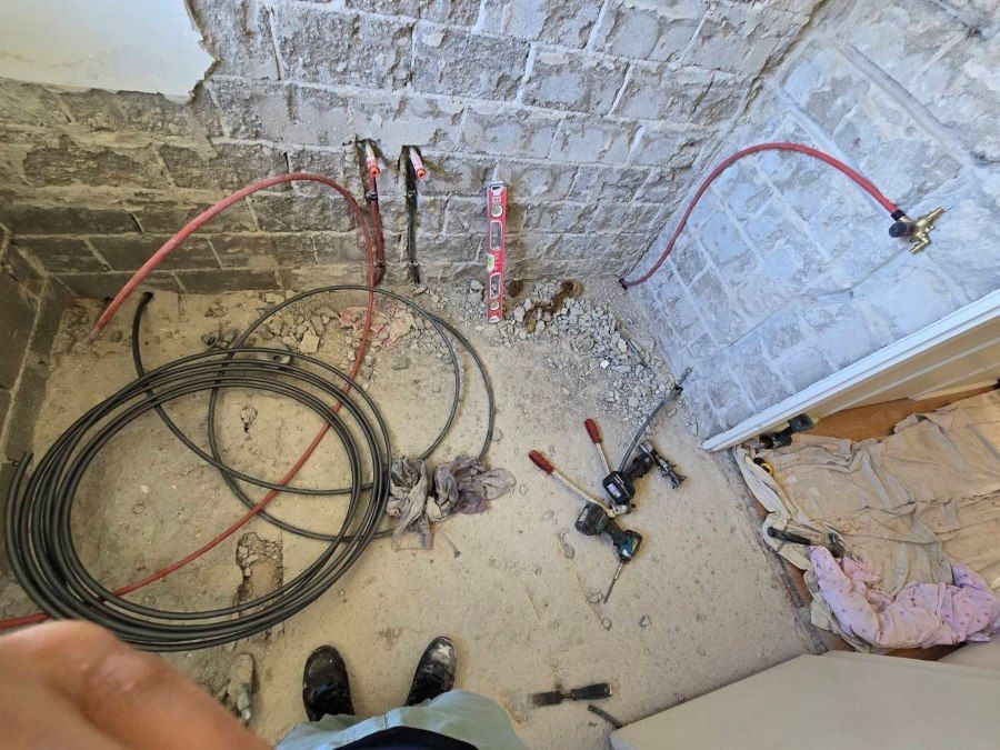 Renovation In Progress: Exposed Pipes, Tools, And Wires — David Son Tiling in Springdale Heights, NSW