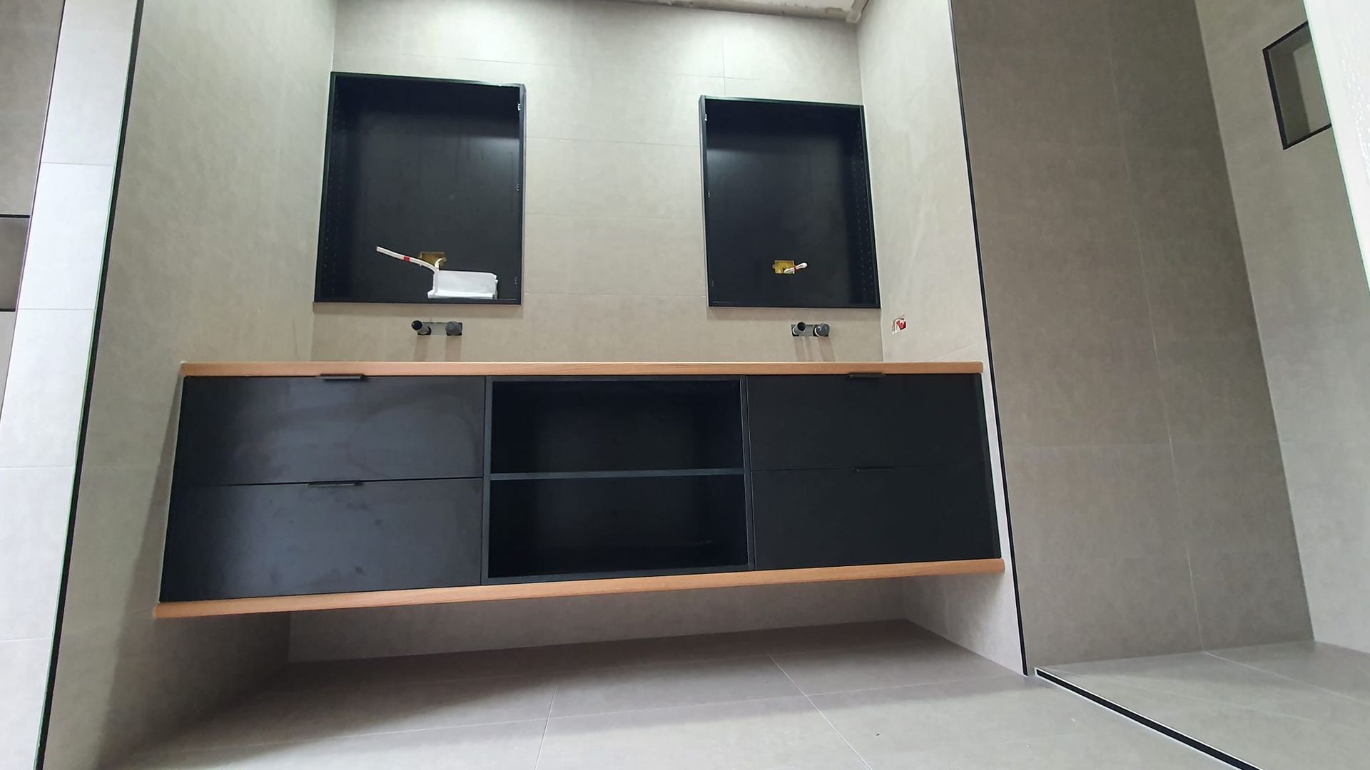 Black Bathroom Vanity With Storage, Light Wood Shelf — David Son Tiling in Springdale Heights, NSW