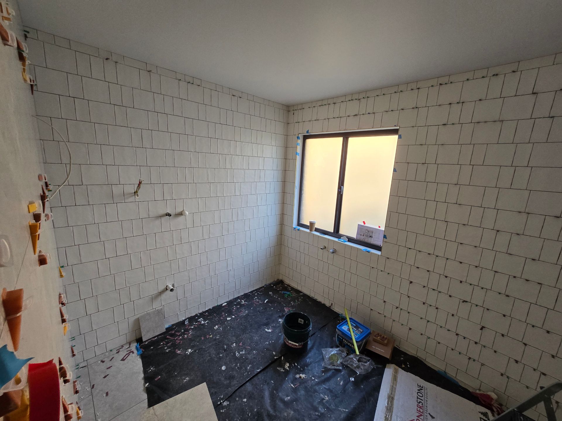 Bathroom With White Vanity, Sink, And Tiled Floor — David Son Tiling in Springdale Heights, NSW
