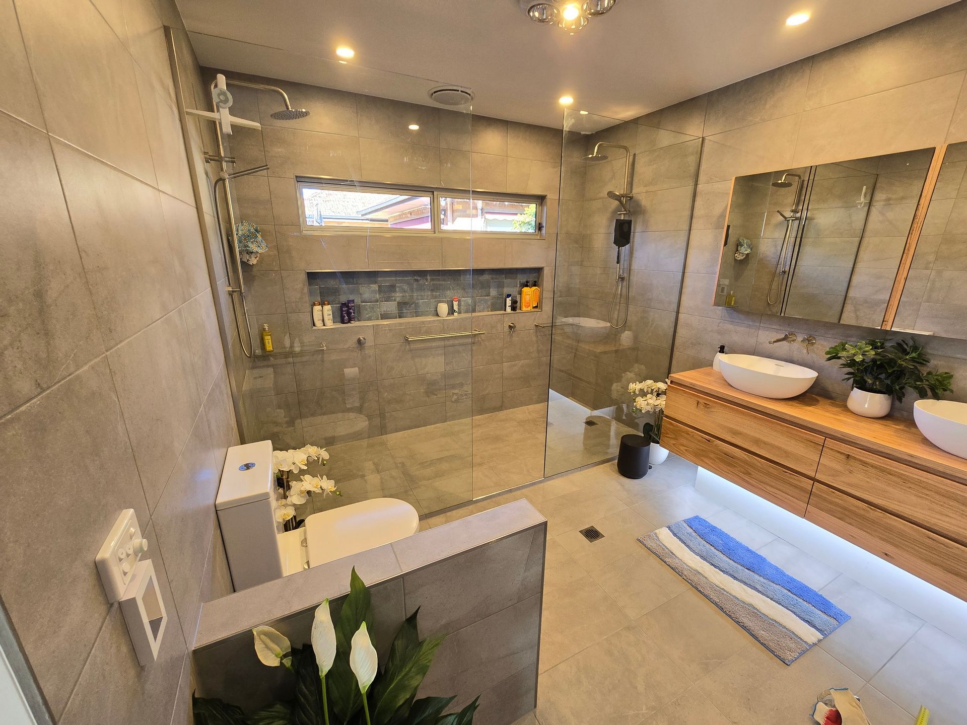 White Tiled Shower With A Built-in Shelf — David Son Tiling in Springdale Heights, NSW