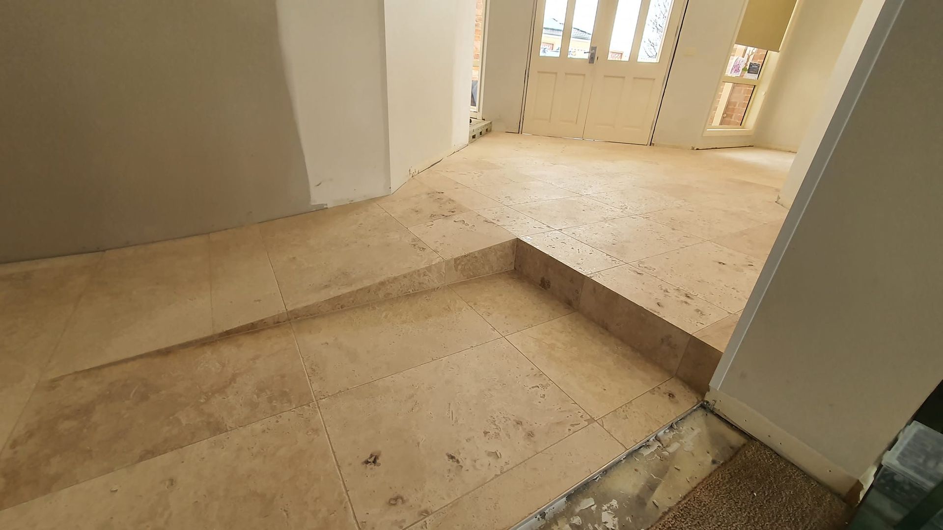 Three Concrete Steps Leading Up To A Porch With Brick Pillars And A Red Door — David Son Tiling in Springdale Heights, NSW