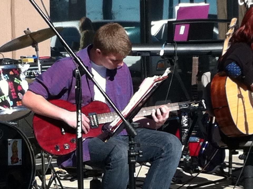 Ryan mastering advanced songwriting and music theory as an adult student at Vic Grady Music