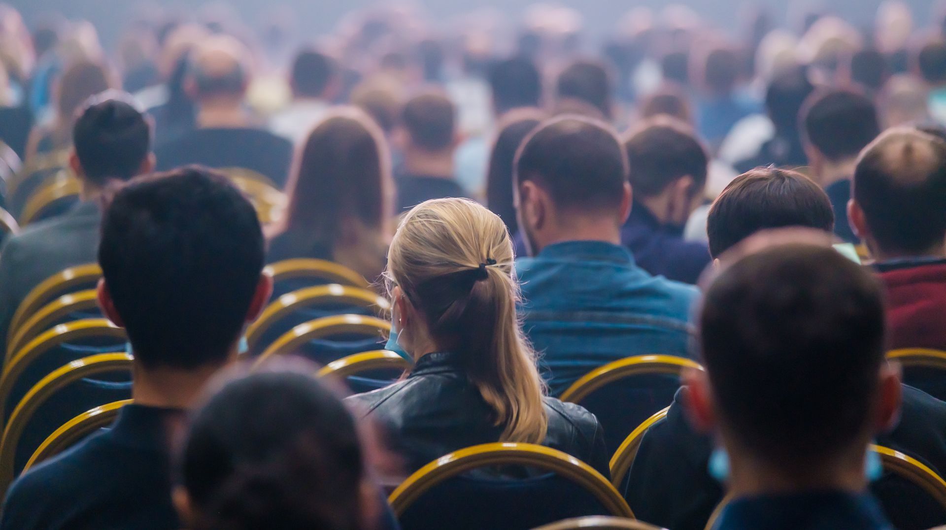 people sitting at a conference