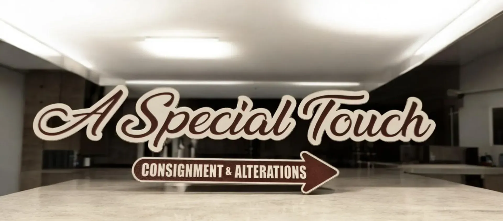 A sign that says a special touch on it