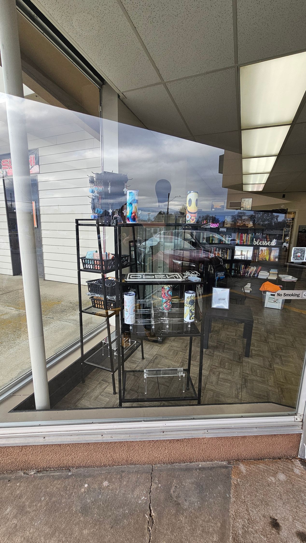 A group of people are posing for a picture in a park.