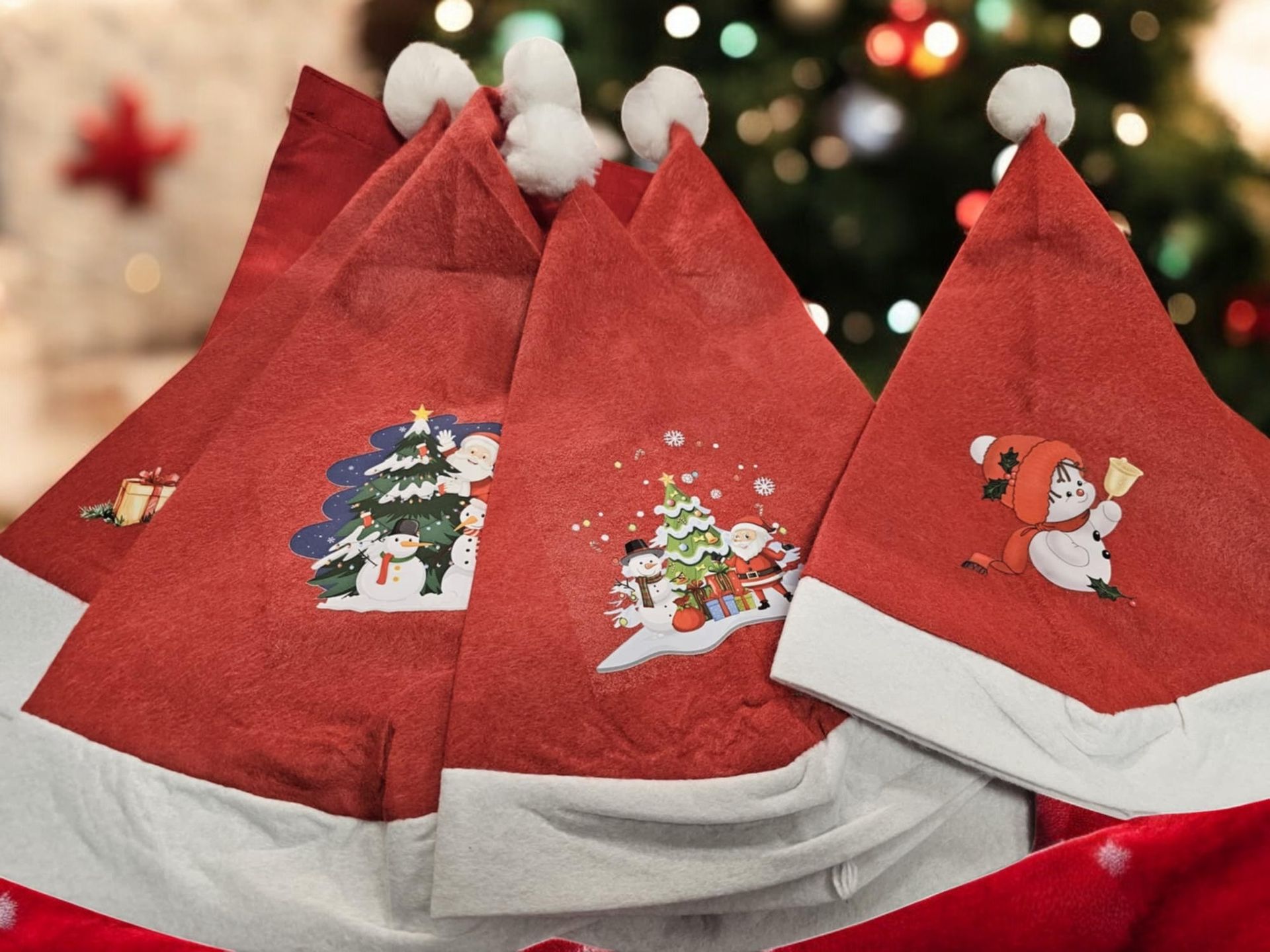 A bunch of santa hats are sitting in front of a christmas tree