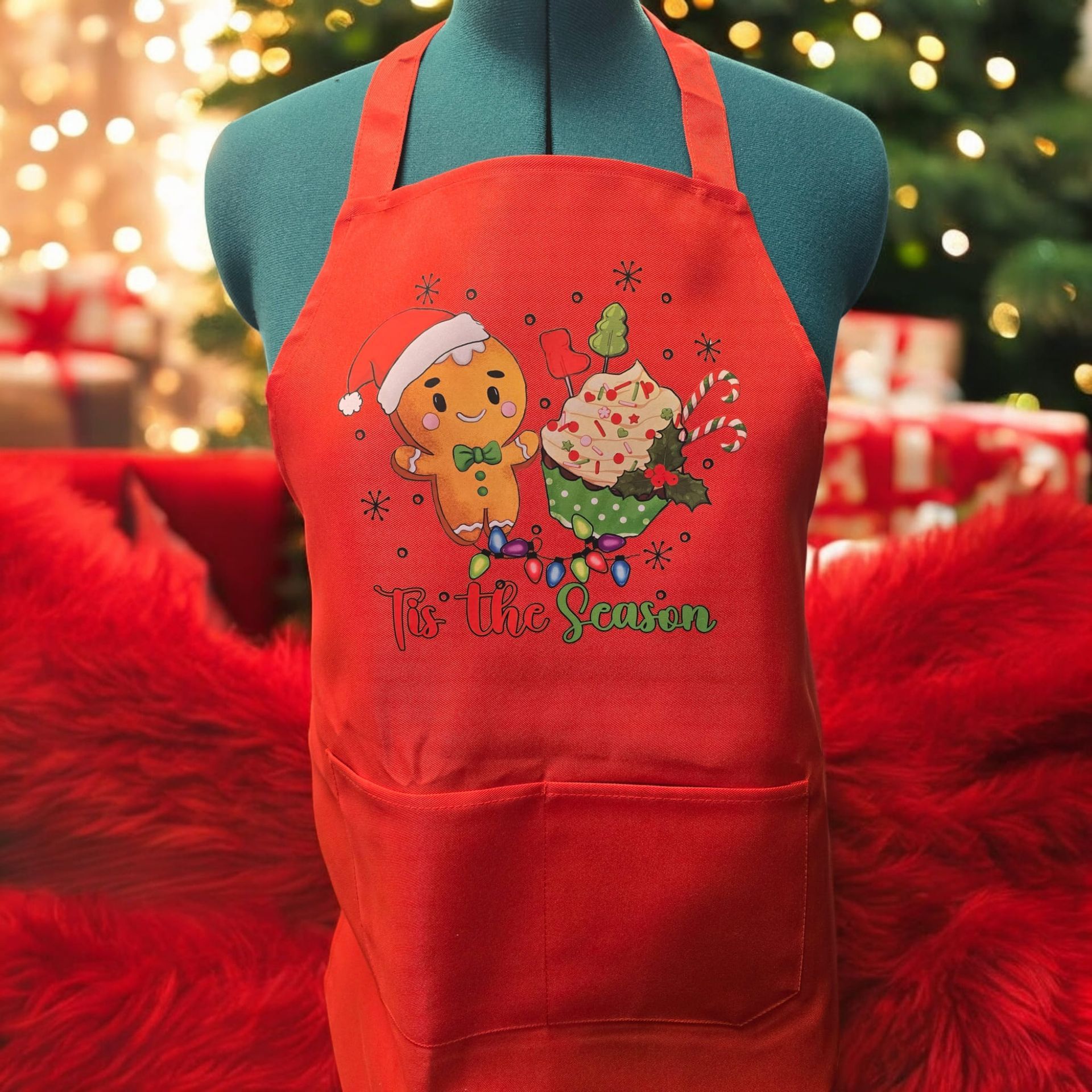 A red apron with a gingerbread man on it
