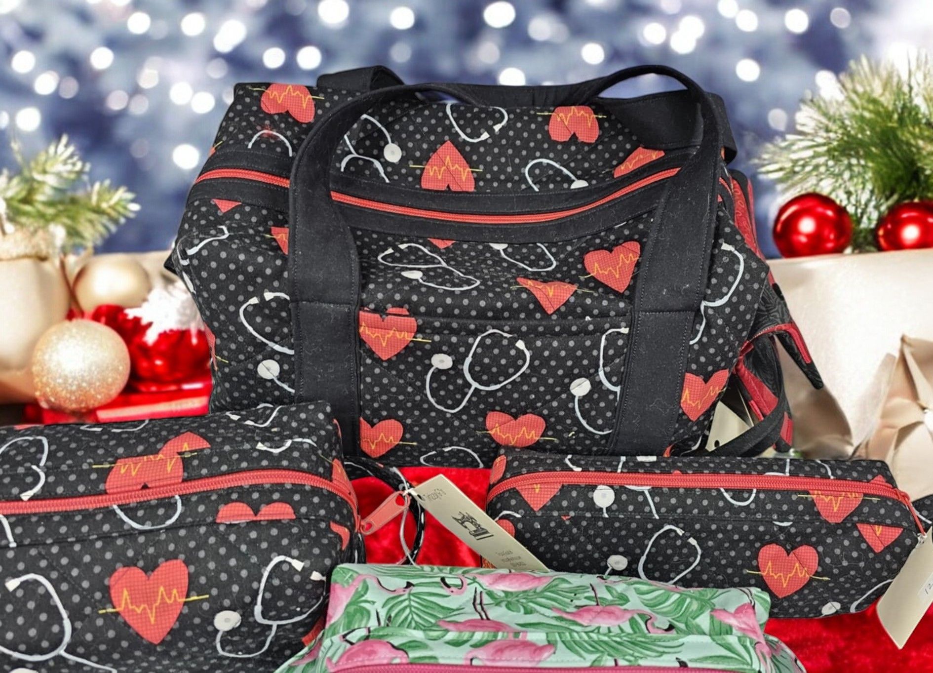 A black bag with red hearts and stethoscopes on it