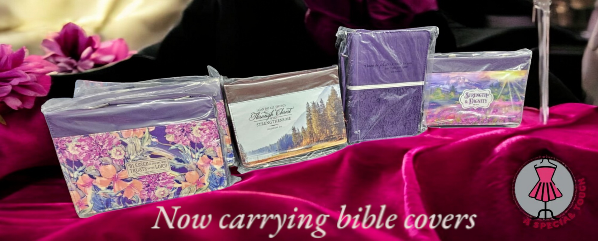 A display of bible covers on a table with the words now carrying bible covers
