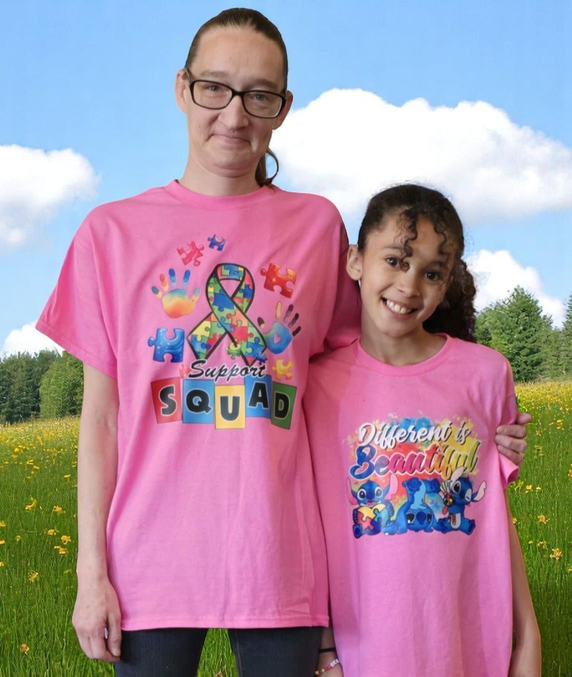 A woman and a girl wearing pink shirts that say support squad