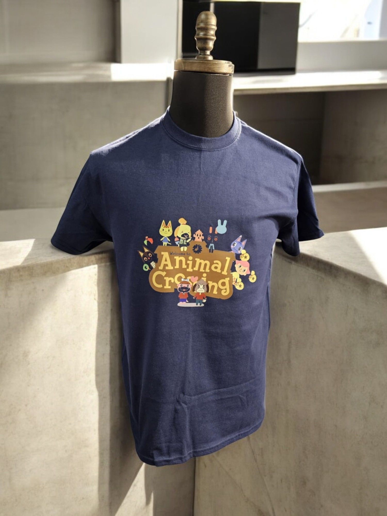 A blue animal crossing t-shirt is on a mannequin.