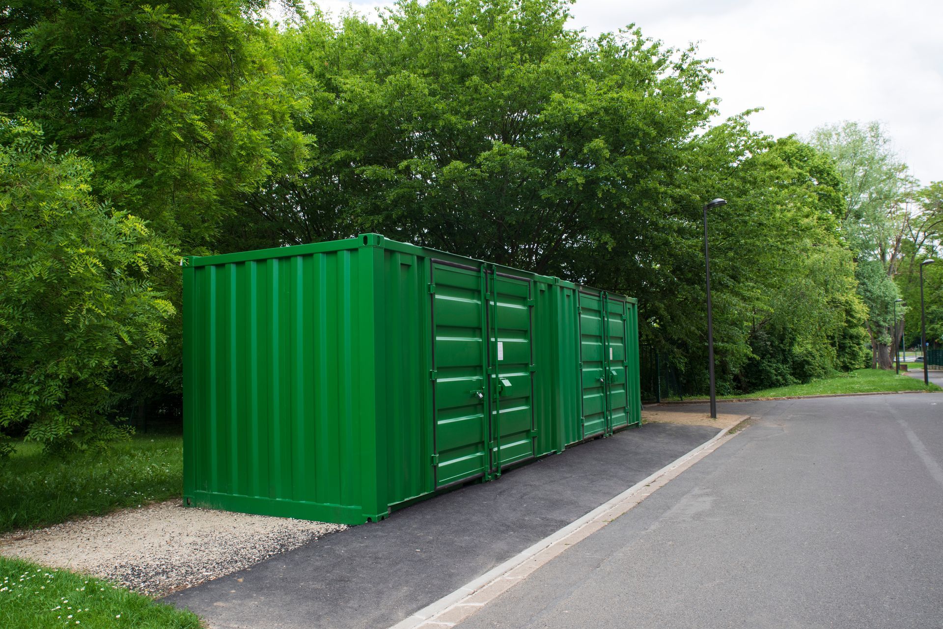 A red pen rests on a printed Rent to Own contract document.