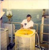 Man Checking On Air Conditioning Outdoor Units - Freeport, TX - A1 Comfort Systems