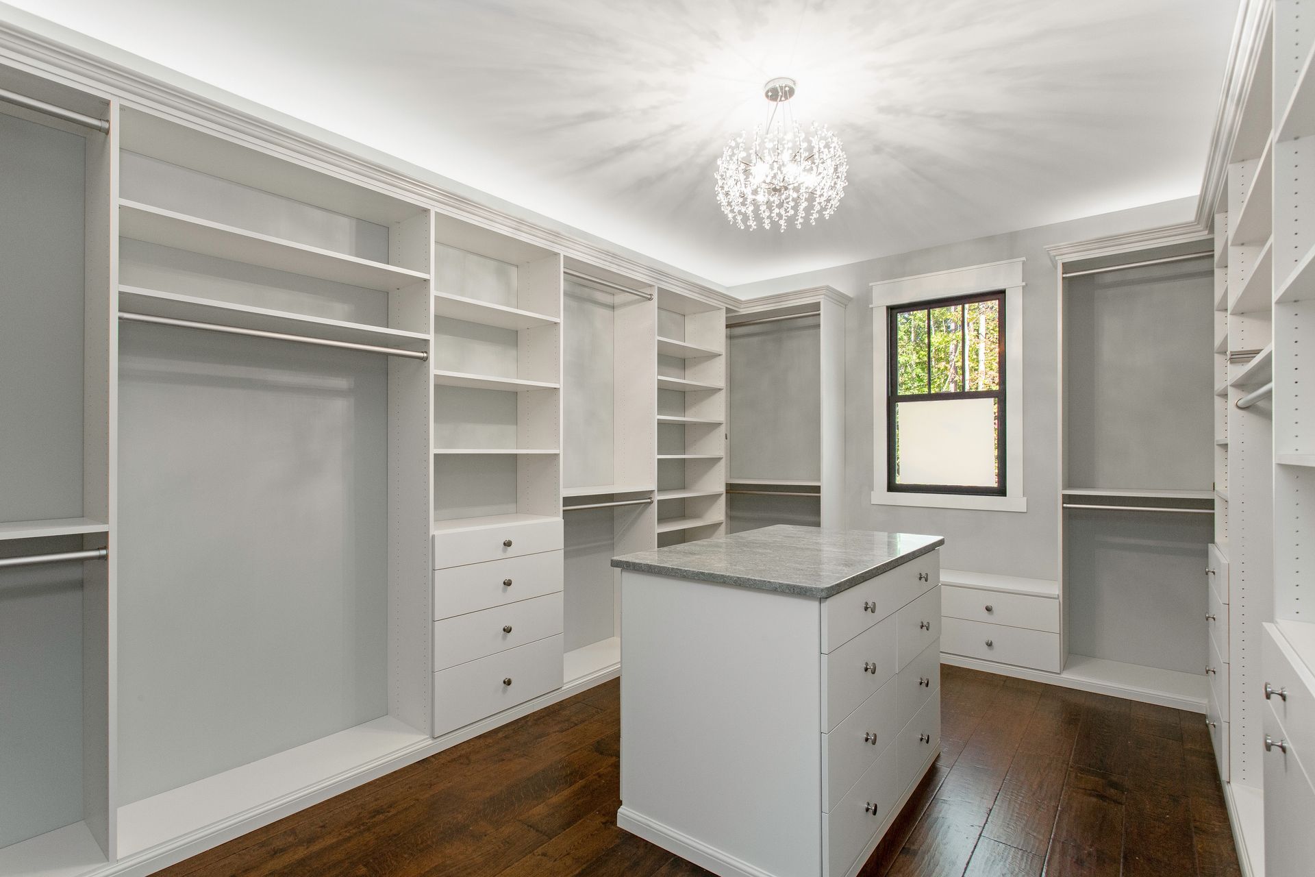Custom walk in closet design with built in shelving NJ