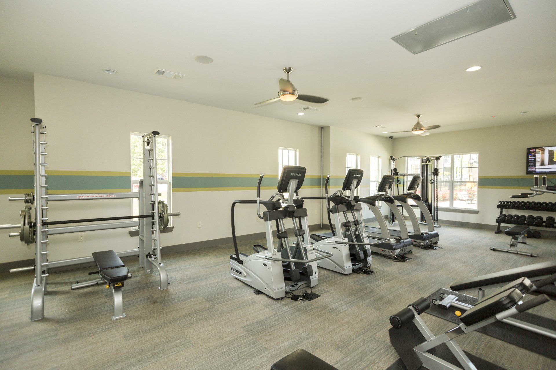 A gym with treadmills and exercise bikes at Thomaston Crossing.