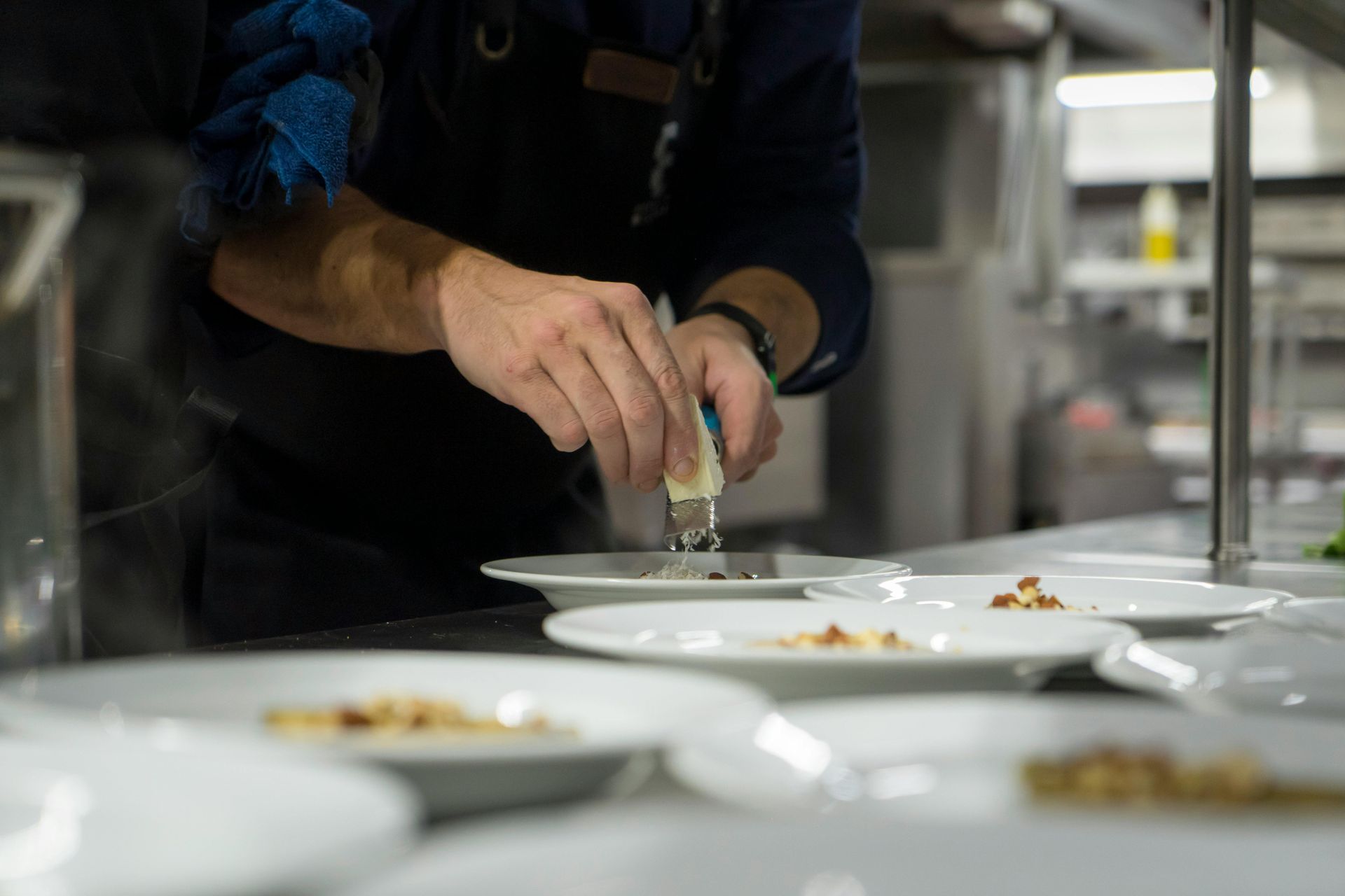 A chef preparing food in the restaurant kitchen
