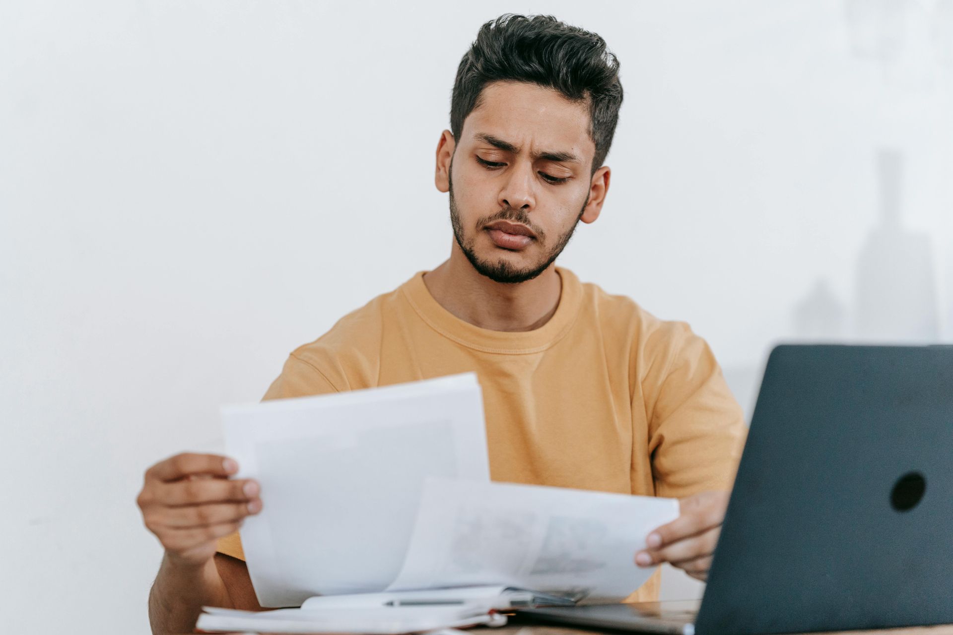 A man checking reviews for an HVAC contractor company