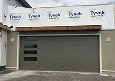 SOLID DOOR INSTALLATION IN PROGRESS - garage doors in Bozeman, MT