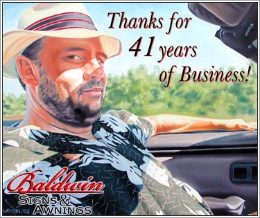 A painting of a man in a car says thanks for 41 years of business