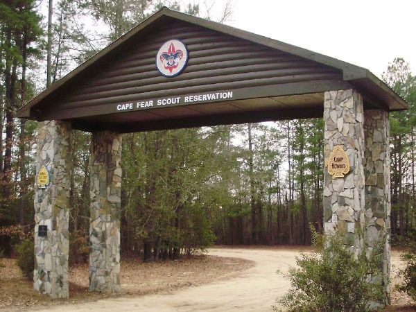 A stone archway leading to a scout reservation