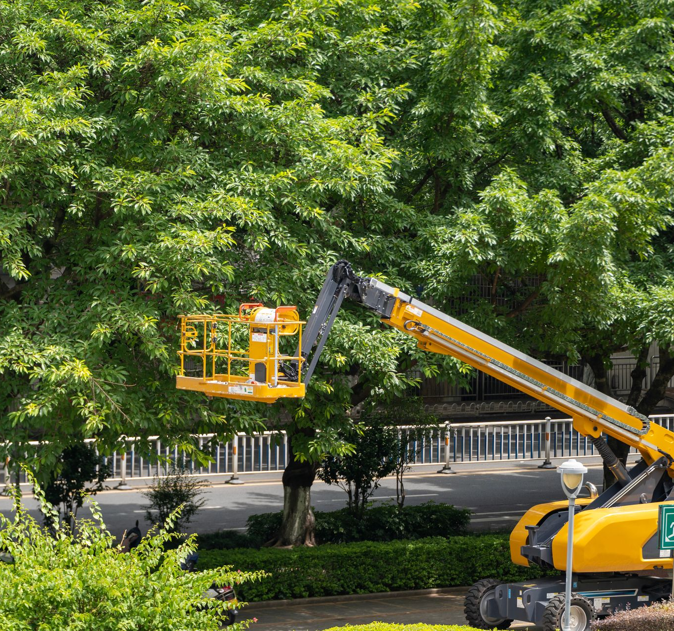 A construction truck for pruning branches. A construction truck for pruning branches.