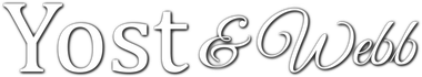 Yost & Webb logo in gray serif lettering with a decorative ampersand