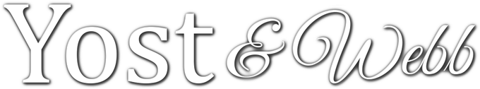 Yost & Webb logo in gray serif lettering with a decorative ampersand
