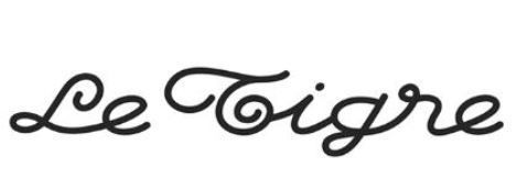 Un logo noir et blanc pour le tigre sur fond blanc.