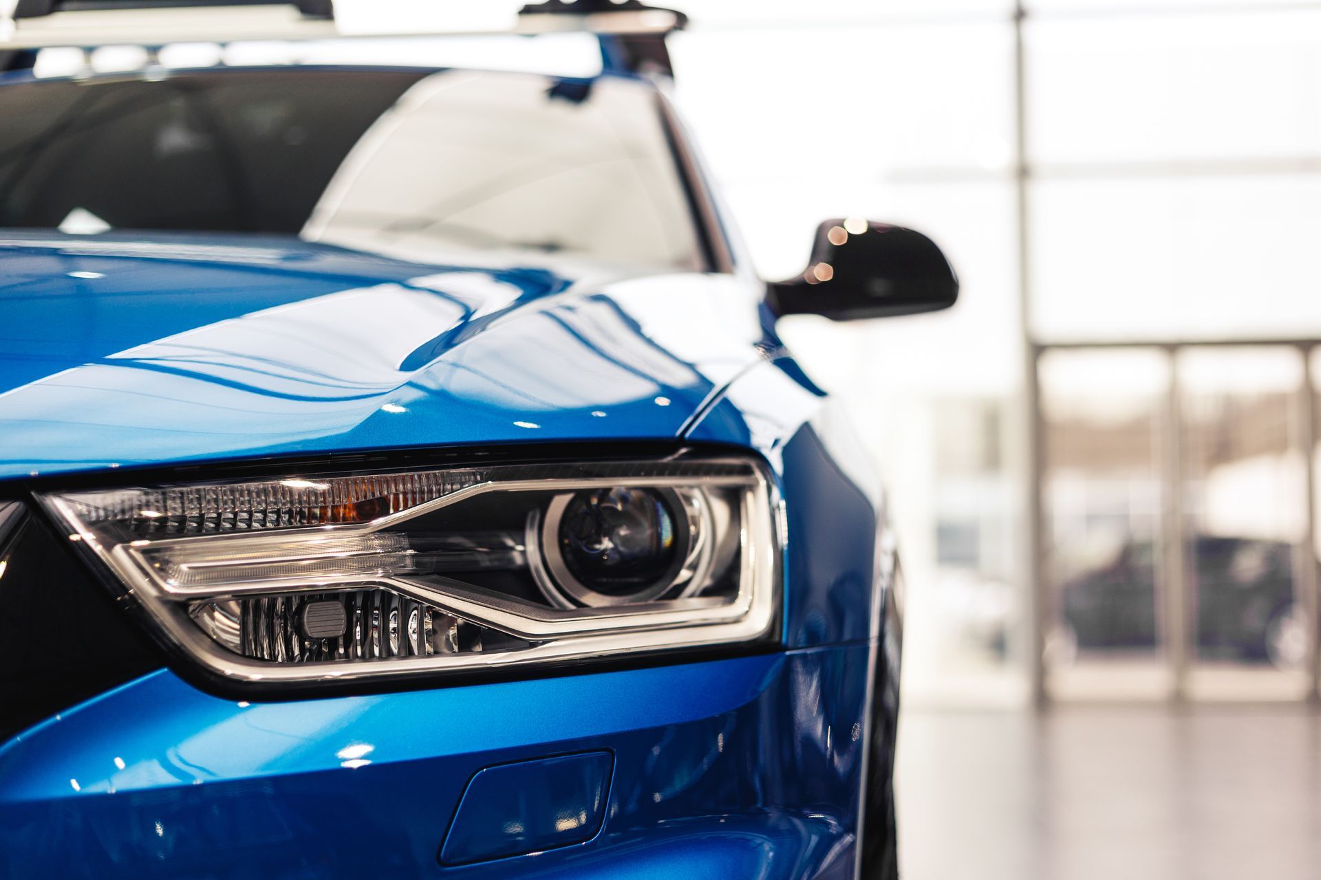 A close up of a blue car | Priced Right Auto