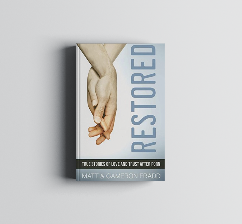A book cover with two hands holding each other on it.