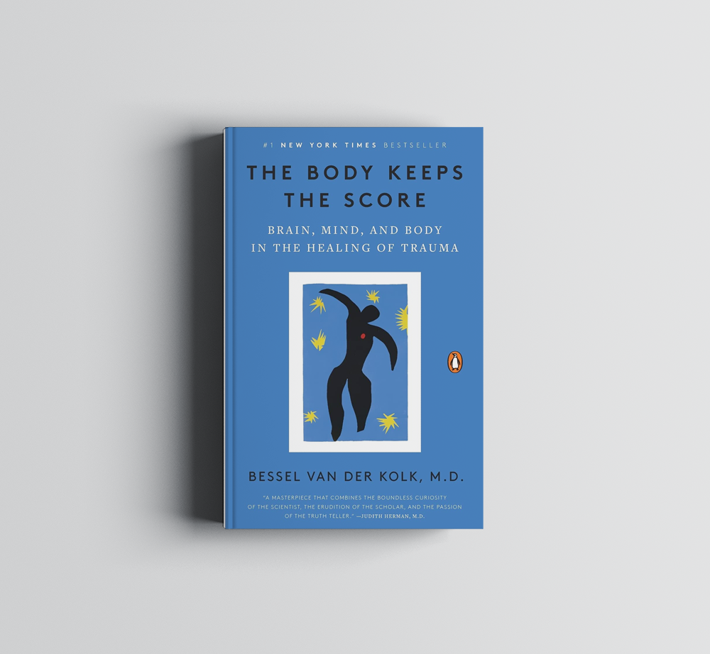 A blue book titled the body keeps the score