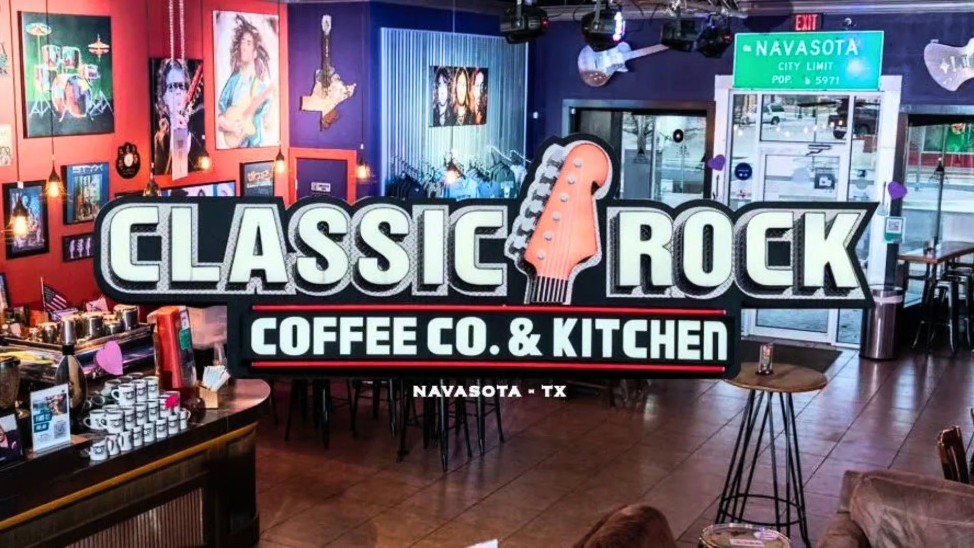 Interior of Classic Rock Coffee Co. & Kitchen in Navasota, TX, featuring music-themed decor and guitar wall art.
