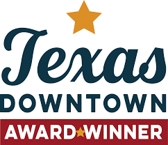 Logo for Texas Downtown Award Winner with blue stylized text, a yellow star, and a red bar featuring white text and a star.