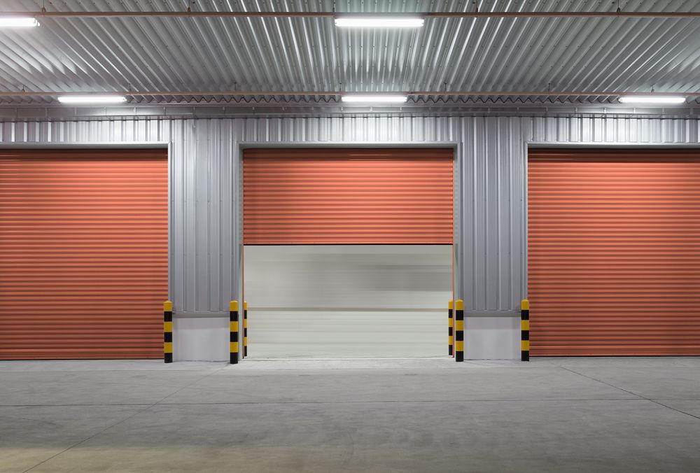 Three Orange Storage Unit Doors — Gympie Mini Storage in Gympie, QLD