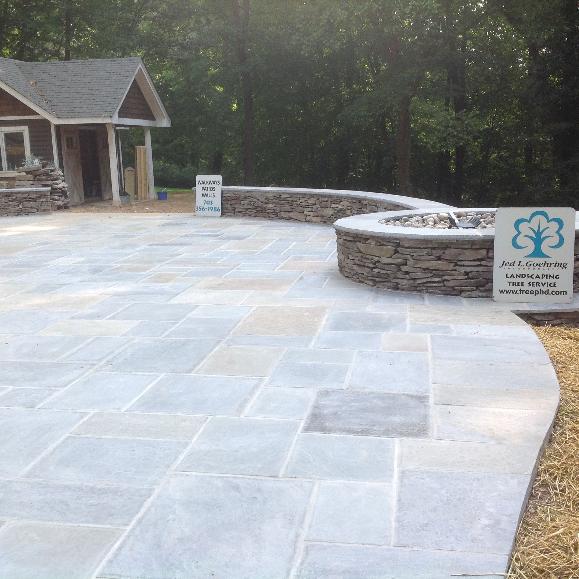 A patio with a sign that says ' a ' on it