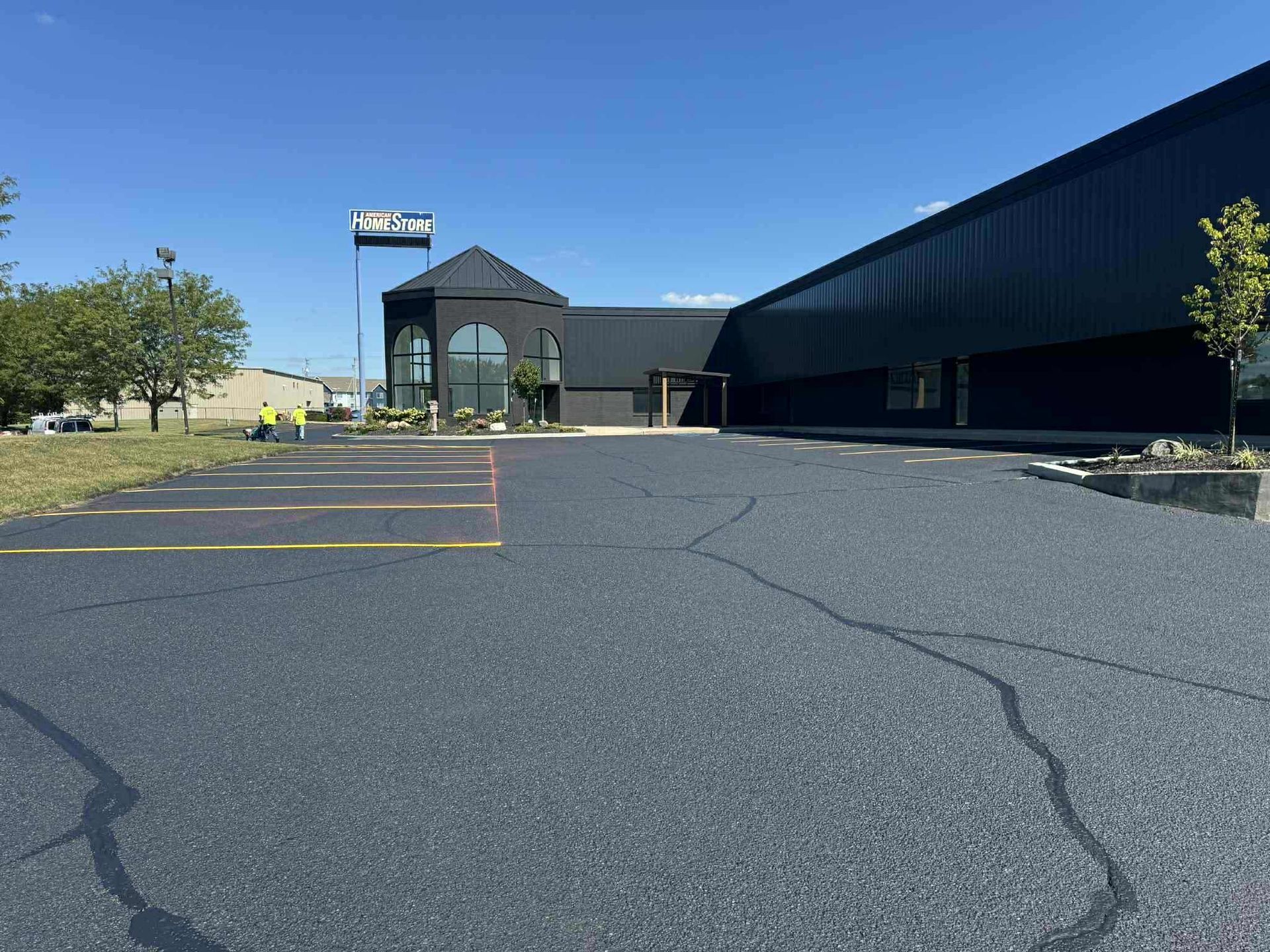 Picture showing parking lot painting services carried out by Midwest Seal Team in a commercial parking lot in Fort Wayne, IN.

